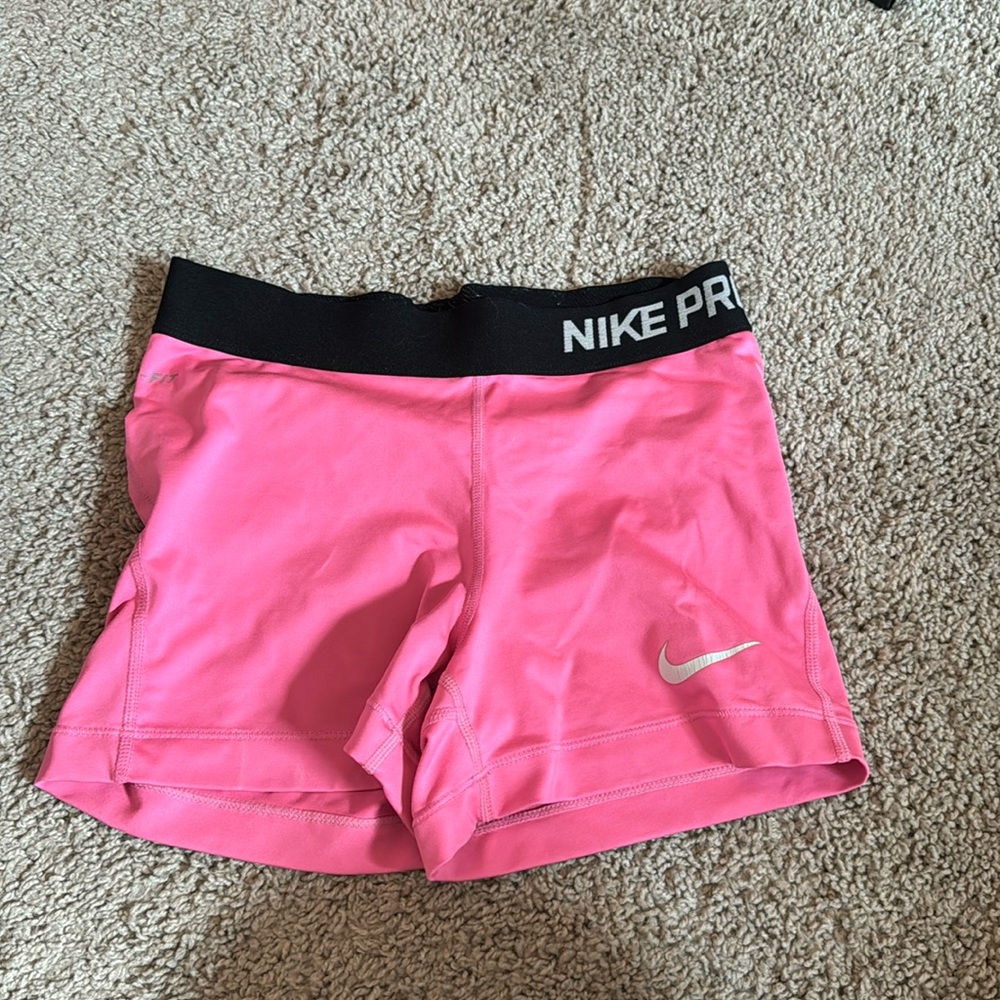 Pink Nike pros